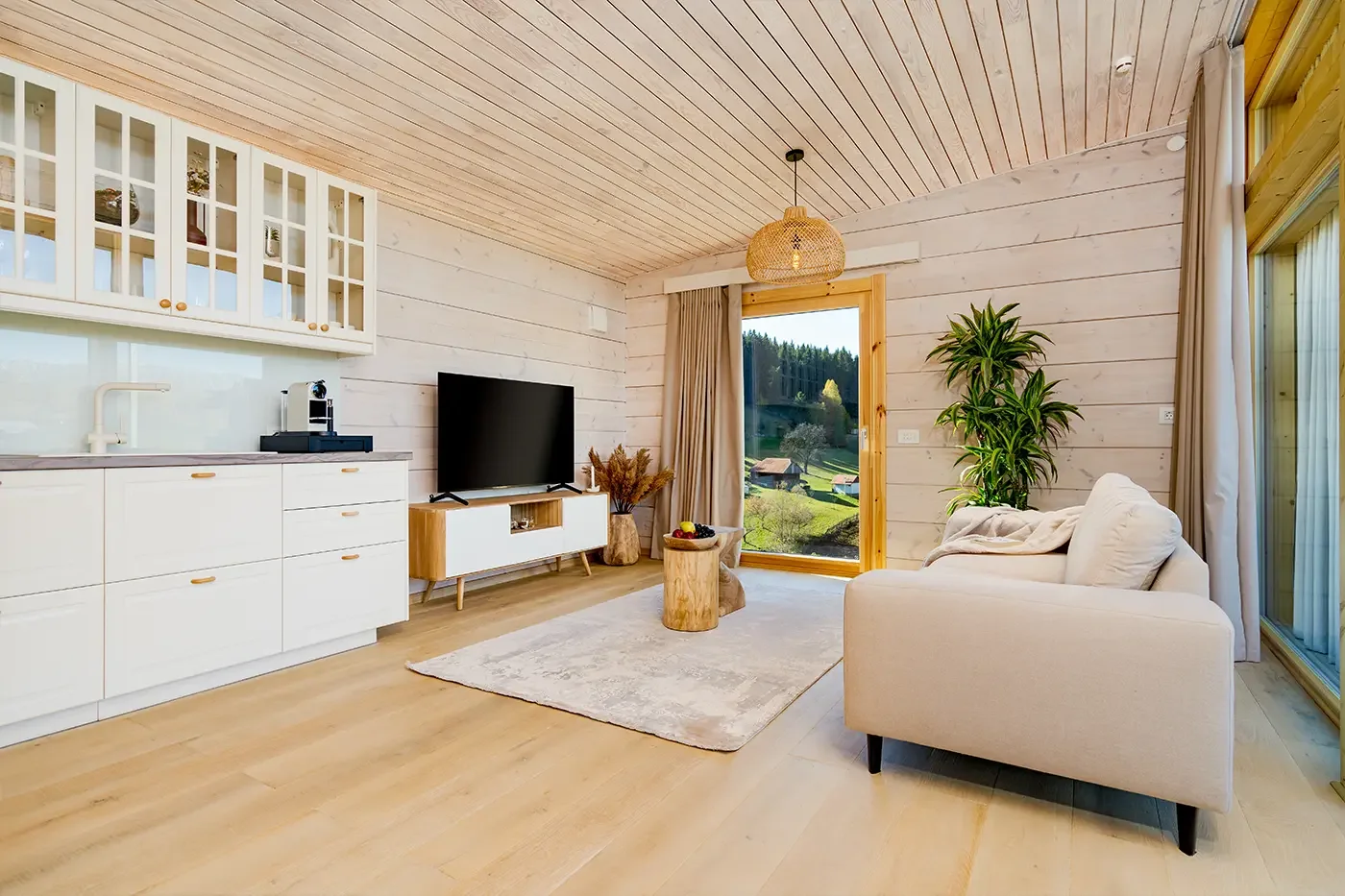 Light and warm interior with natural wood at Sunset Villa